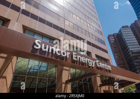 Calgary, Alberta, Canada. Jun 4, 2023. Side view of the main entrance at the Suncor Energy Center building in downtown. Stock Photo