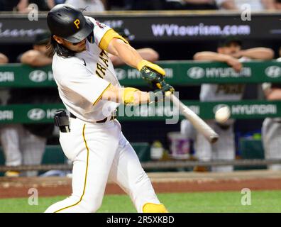 New York Mets shortstop Luis Guillorme, left, tags out Pittsburgh Pirates'  Connor Joe, right, on a steal-attempt at second base in the first inning in  a baseball game in Pittsburgh, Saturday, June