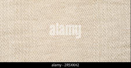 Texture of Light Beige or Sandy-Colored Cotton Fabric Stock Photo