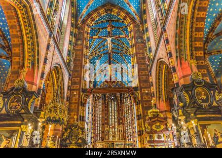 Altar Crucifix Croww Ceiling Triptych St Mary's Basilica Church Krakow Poland. Buit first in 1300s and the interior in 1700s Stock Photo