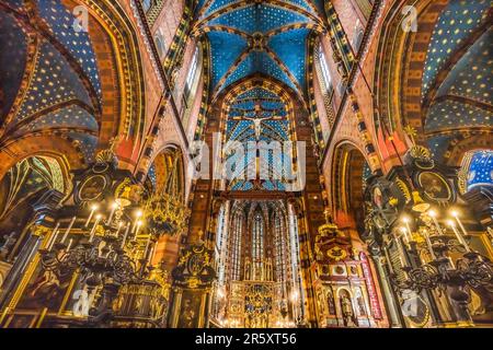 Altar Crucifix Cross Ceiling Triptych St Mary's Basilica Church Krakow Poland. Buit first in 1300s and the interior in 1700s Stock Photo