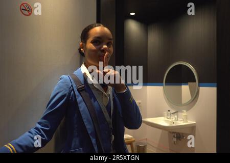 A personal lounge assistant stands at the sleep cabin inside  the KLM crown business lounge in Schiphol airport in Amsterdam Netherlands Stock Photo