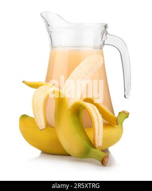 Full jug of banana juice and fruits isolated on white background Stock Photo