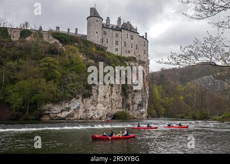 Castle, Chateau de Walzin, below river Lesse with canoeists, province Namur, region Dinant, Belgium Stock Photo