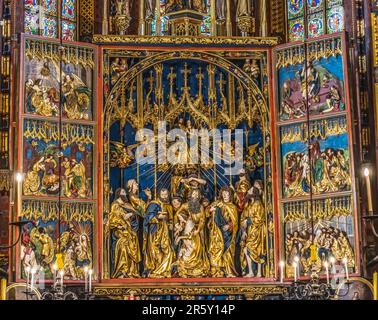 Colorful Veit Stoss Triptych St Mary's Basilica Church Krakow Poland. Stoss carved triptych from 1477 to 1489. Depicts scenes from the life of Mary an Stock Photo