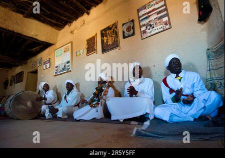 Morocco, traditional musicians with instruments, Pigeons du Sable group ...