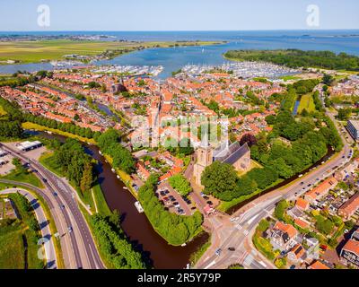 High angle Drone Point of View on the City of Monnickendam, North Holland, Netherlands on sunny spring day in June Stock Photo