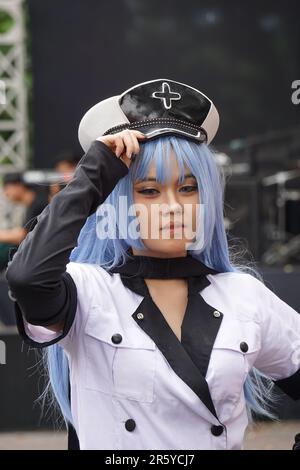 Japan anime cosplay, portrait of a cosplayer in natural background Stock Photo