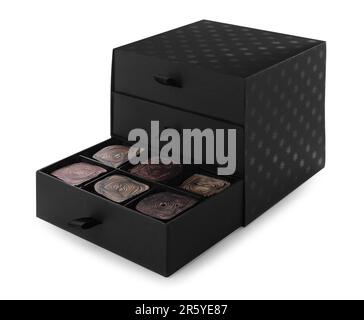 Box of delicious chocolate candies isolated on white Stock Photo