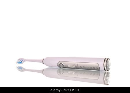 One electric toothbrush, macro, isolated on a white background. Stock Photo