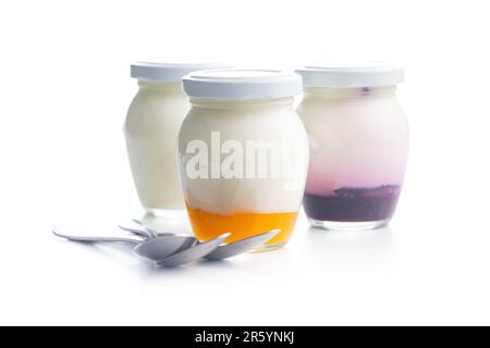 White and fruity yogurt in jar isolated on the white background. Stock Photo