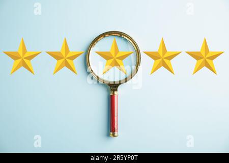 Magnifier glass inspecting five stars icon for customer rating service ...