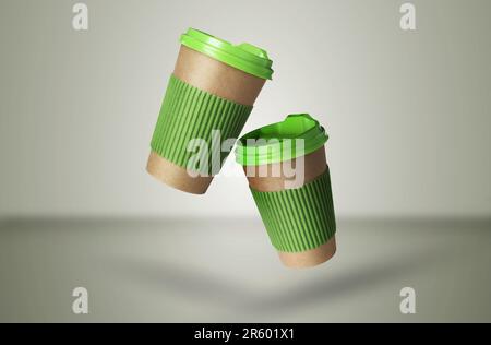 Takeaway paper cups falling on color background Stock Photo