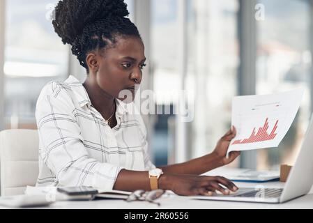 Laptop, documents and woman with data analysis, seo research or website statistics review, focus and planning. Financial analytics and paperwork of Stock Photo