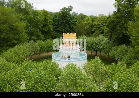 A view of Portuguese artist Joana Vasconcelos' new installation Wedding Cake at Waddesdon Manor in Aylesbury, Buckinghamshire. The 12-metre-high sculptural pavilion in the form of a three-tiered wedding cake is clad in ceramic tiles and was comissioned by the Rothschild Foundation for Waddesdon. Picture date: Tuesday June 6, 2023. Stock Photo