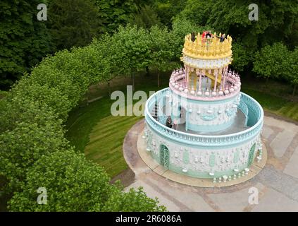 A view of Portuguese artist Joana Vasconcelos' new installation Wedding Cake at Waddesdon Manor in Aylesbury, Buckinghamshire. The 12-metre-high sculptural pavilion in the form of a three-tiered wedding cake is clad in ceramic tiles and was comissioned by the Rothschild Foundation for Waddesdon. Picture date: Tuesday June 6, 2023. Stock Photo