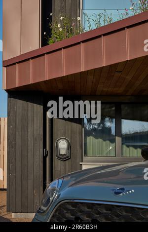 Electric Vehicle Charger Stock Photo