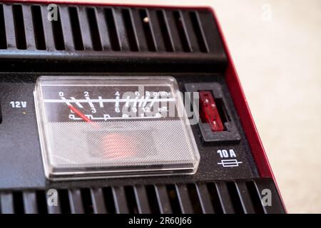 Car battery charger close up view on isolated background Stock Photo