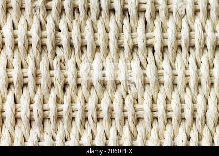 Wicker straw textured background, close-up Stock Photo