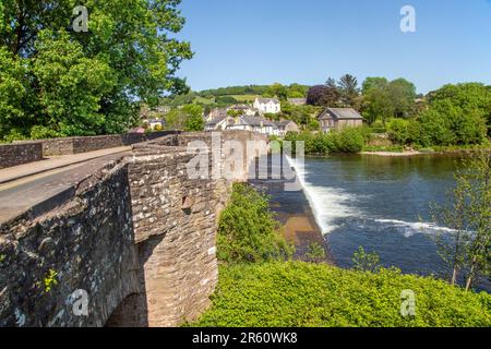 The river Usk flowing under the ancient Crickhowell Bridge in the South Wales town of Crickhowell Powys, Stock Photo