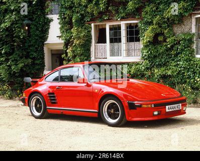 Classic Car. 1985 Porsche 911 (930) Turbo SE 'Flat Nose' on driveway outside house. Stock Photo