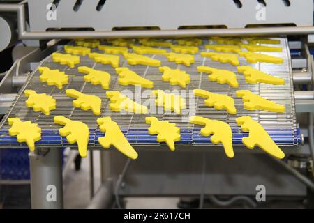 A Food Processing Machine with Demonstration Dinosaurs. Stock Photo