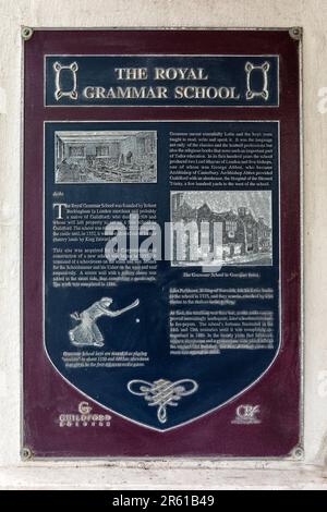 Surrey, UK - April 5th 2023: A plaque on the exterior of the Royal Grammar School in the town of Guildford in Surrey, UK. Stock Photo