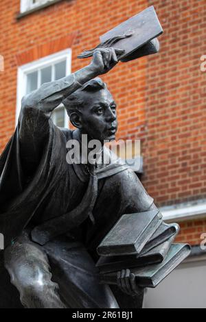 Surrey, UK - April 5th 2023: Close-up of The Surrey Scholar statue, located on the High Street in the town of Guildford in Surrey, UK. Stock Photo