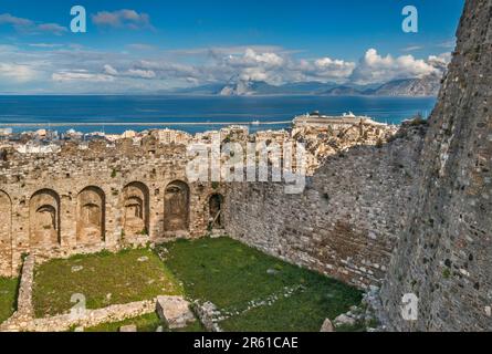 Patras Fortress (Kastro), cruise ship at Gulf of Patra wharf, Arakynthos Mountains in distance, city of Patra, Peloponnese peninsula, Greece Stock Photo