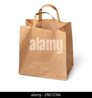 Single empty blank eco paper bag isolated on white background Stock Photo