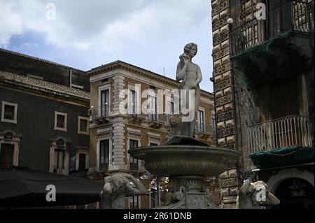 Cityscape with scenic view of the Fontana dell'Amenano on the south side of the Piazza del Duomo in Catania Sicily, Italy. Stock Photo