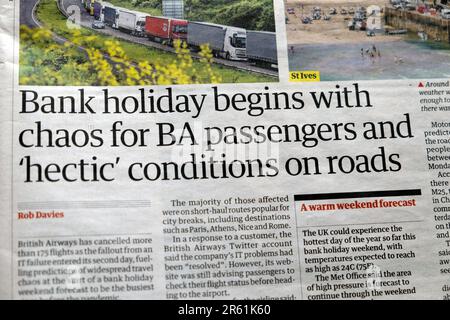 'Bank holiday begins with chaos for BA passengers and 'hectic' conditions on roads' Guardian newspaper headline travel article 27 May 2023 London UK Stock Photo