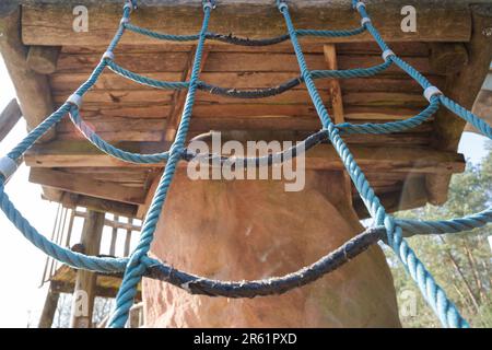Blue climbing net for children on the playground Stock Photo