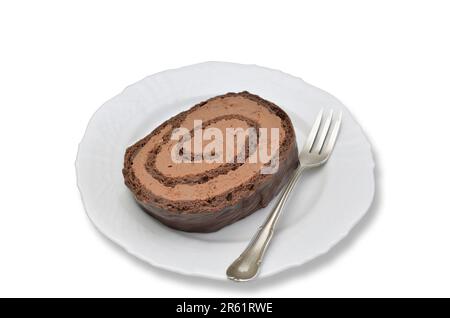 Piece of Chocolate fancy cake on white Plate, close up, isolated on white background Stock Photo