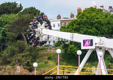 Thrill-seekers on the Axis ride in Adventure Island in Southend on Sea, Essex, UK, Stock Photo