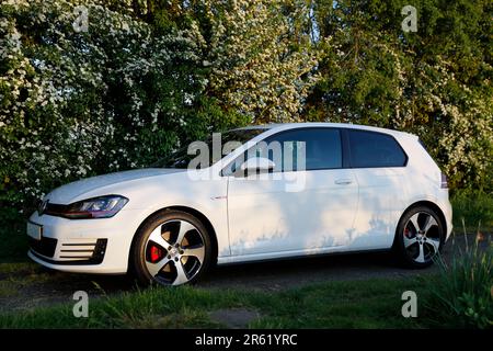 New White Car, Volkswagen Golf GTI MK7 3 door hatchback petrol car Stock Photo