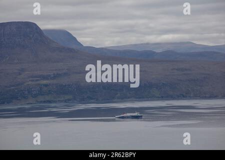 There is nothing more satisfying than a dry, windy (no midges) day in the NW Highlands - Ben Mor Coigagh hike. Stock Photo