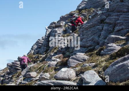 There is nothing more satisfying than a dry, windy (no midges) day in the NW Highlands - Ben Mor Coigagh hike. Stock Photo