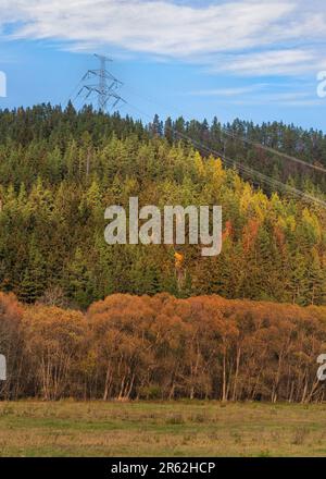 Large metal power pylon under electricity lines built in countryside ...