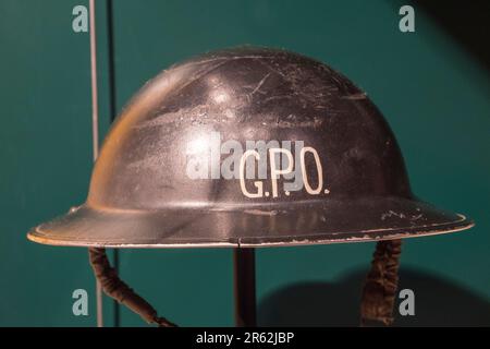 A GPO Civil Defence helmet (1939-45) used by a member of the Post Office Home Guard on display in the Postal Museum in London, UK. Stock Photo