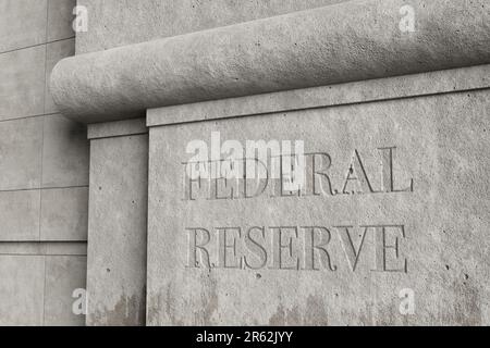 Retro style concrete wall engraved with the word FEDERAL RESERVE. Illustration of the concept of the issues and affairs related to federal reserve Stock Photo