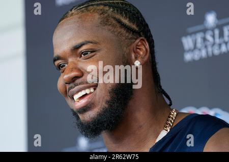 Tennessee Titans linebacker Azeez Al-Shaair, left, walks off the field  before an NFL football game against the Los Angeles Chargers, Sunday, Sept.  17, 2023, in Nashville, Tenn. (AP Photo/George Walker IV Stock