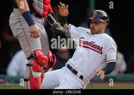 Oakland Athletics shortstop Aledmys Diaz (12) throws to first as Cleveland  Guardians' Steven Kwan (38) slides into second on a double play hit into by  Jose Ramirez during the third inning of