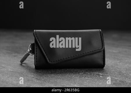 Stylish leather keys holder on grey table, closeup Stock Photo