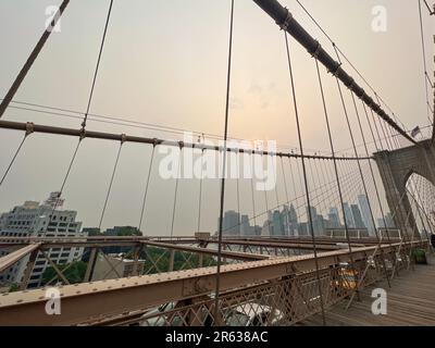 New York City, United States. 6th June, 2023. The New York City skyline was covered with smoke as harmful smoke wafted from more than a hundred wildfires burning in Quebec, Canada. Credit: Ryan Rahman/Alamy Live News Stock Photo