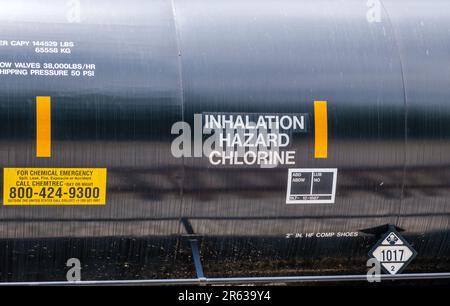 NEW ORLEANS, LA, USA - JUNE 2, 2023: Railroad tank car displaying 'Inhalation Hazard Chlorine' warning and an emergency number Stock Photo