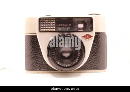 A very Old vintage black and white photography camera on White Background. Stock Photo