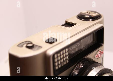 A very Old vintage black and white photography camera on White Background. Stock Photo