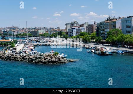 Small fishing boats docked in the marina at Cannakale in Turkiye. Canakkale is a city located on the Dardanelles Strait. Stock Photo