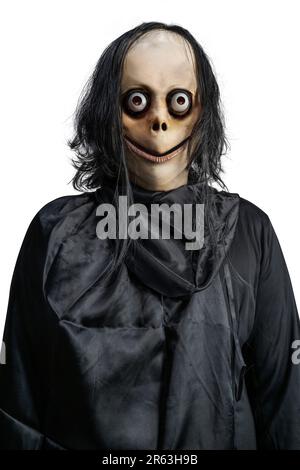 Scary Momo standing behind the wall in the dark background. Scary face for  Halloween. Halloween concept Stock Photo - Alamy